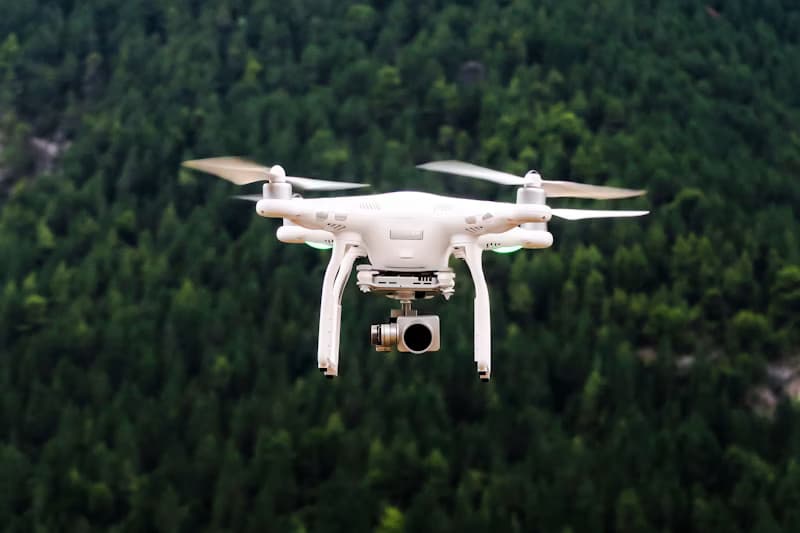 Drone videographer filming aerial footage